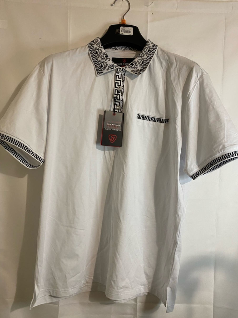 White Polo with Black Geometric Trim by Sergio Codri